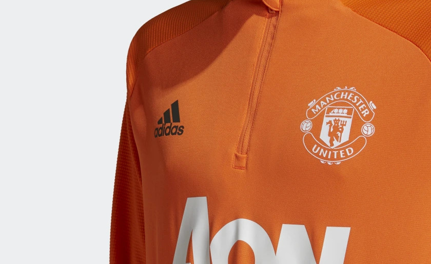 manchester-united-trainingspak-2021-oranje.jpg
