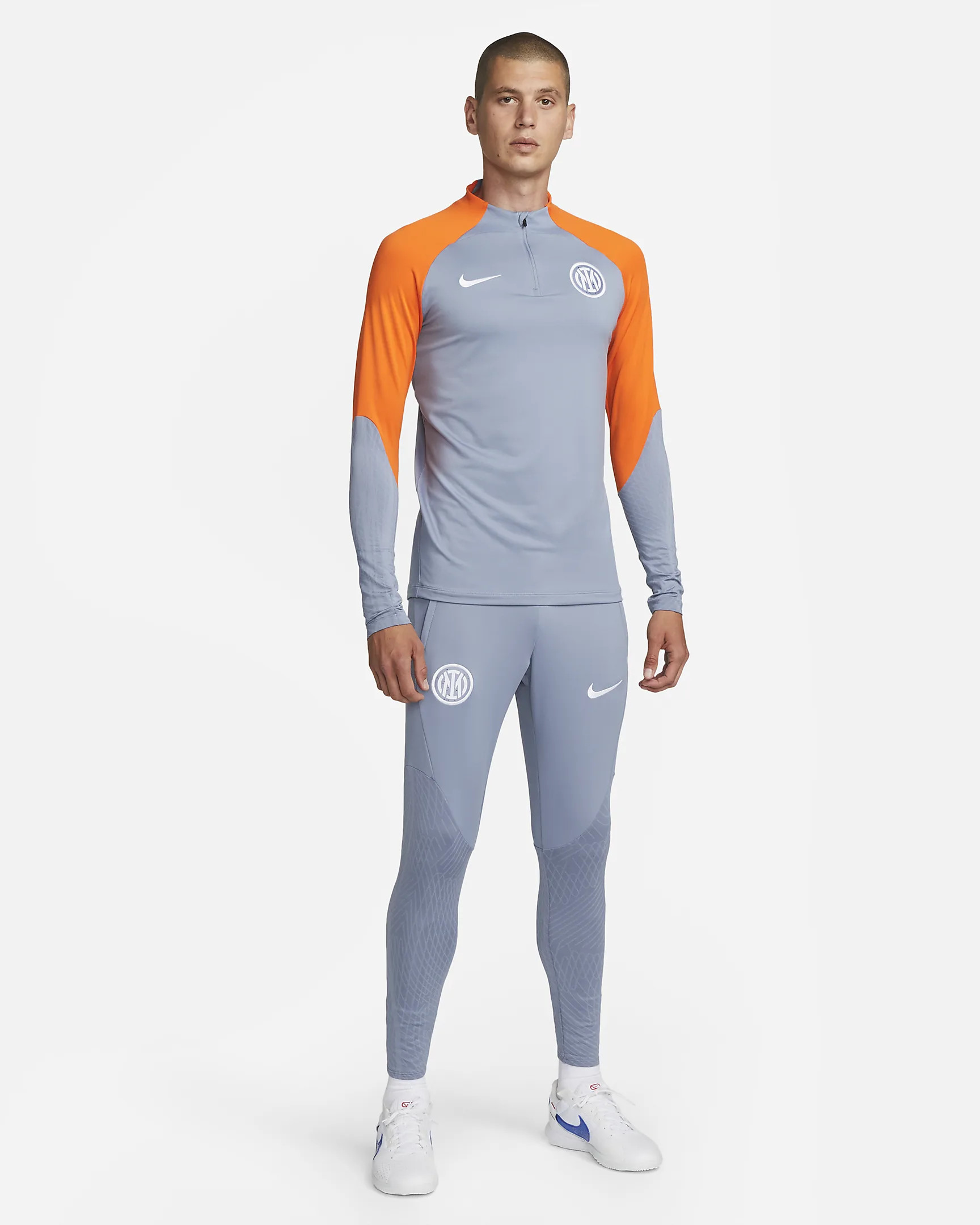 Tuta d’allenamento Champions League dell’Inter 2023-2024: grigio e arancione